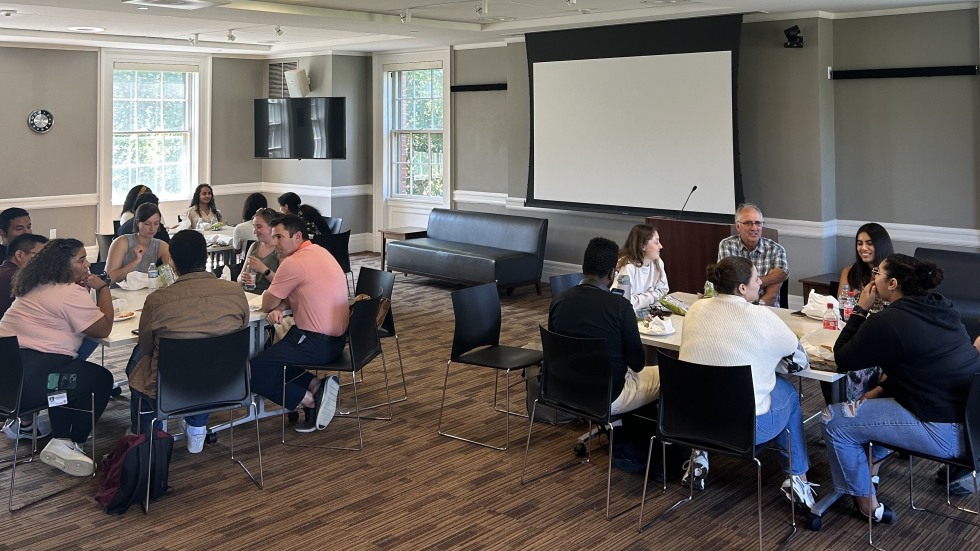 Several people seated in a room